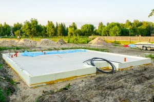 Slab concrete foundation of a new modern home